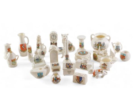 A quantity of crested china, to include a Great Yarmouth sports bag, cats, boat, longcase clock, a Goss model of an ancient P