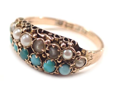 An 18ct gold turquoise and seed pearl dress ring, of two panelled design with raised scroll shoulders, with rubbed hallmarks,