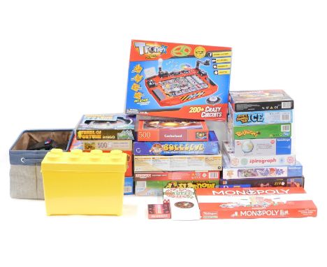 A quantity of boxed jigsaws, Super Mario game, Monopoly, Mario Kart game, Buckaroo, Tronex, etc. 