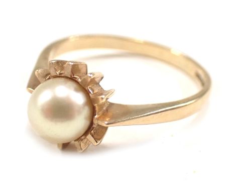 A 9ct gold dress ring, with central cultured pearl, in star setting, ring size S½, 3.3g all in. 