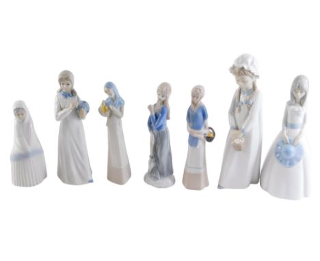 A group of Nao and other Spanish porcelain figures, the largest 26cm high. (7) 