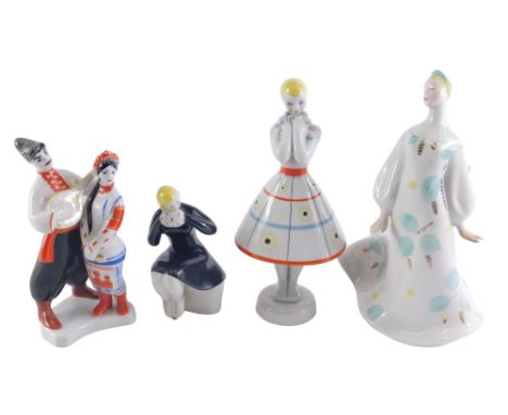 Four Russian porcelain figures, comprising girl in black skater dress on perch, stamped USSR, 13cm high, figure group stamped