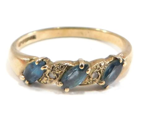 A 9ct gold half hoop dress ring, set with three marquise shaped turquoise stones and set with illusion set czs, maker GJ, Bir