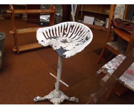 Metal tractor seat made into a chair