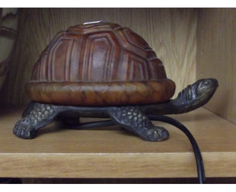 Glass and metal tortoise lamp