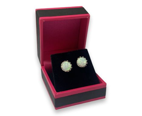 Pair of silver and opal stud earrings, weighing 2.37 grams 