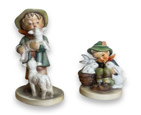 2 x Vintage Hummel figures, to include Boy with Lamb and Boy with Rabbits, both in good condition 