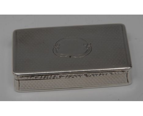 An early Victorian silver waisted rounded rectangular snuff box, hinged cover with foliate thumbpiece, engine turned overall 