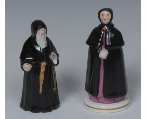 A Samson Hancock Derby figural candle snuffer, of a lady, wearing a black cloak, 12cm high, S.H., crown, crossed swords and D