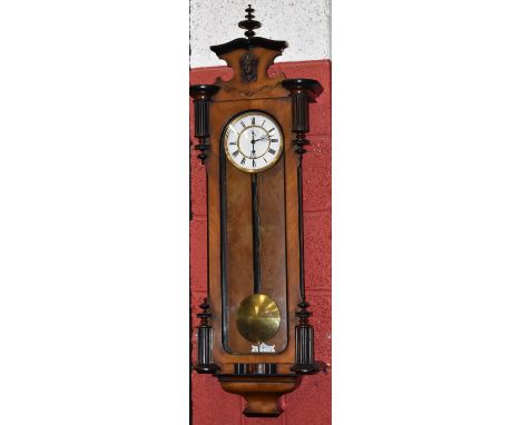 A 19th century walnut and ebonised Vienna regulator wall clock, 17cm enamel dial with Roman numerals and seconds subsidiary, 