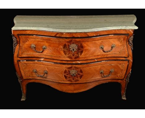 An 18th century Italian gilt metal-mounted walnut and marquetry bombé-shaped commode, serpentine green marble top above two l