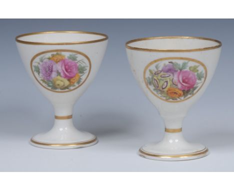 A pair of Mansfield decorated goblets, painted with oval cartouches with colourful summer flowers, gilt line rims, 11cm high,