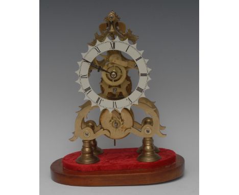 A 19th century brass skeleton clock, 13cm shaped circular enamel dial inscribed with Roman numerals, fusee movement with anch