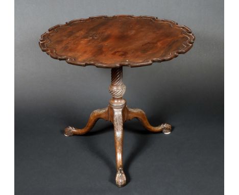A George III Revival mahogany tripod supper table, dished pie crust top, turned and spirally reeded column, cabriole legs car