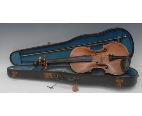 A violin, the two-piece back 35.5cm long excluding button, , Antonius Straduarius label, boxwood tuning pegs, outlined throug