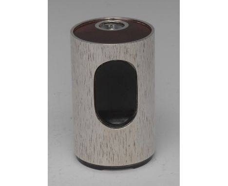 Adrian Gerald Benney - an Elizabeth II silver and enamel cylindrical table lighter, bark textured overall, the top decorated 