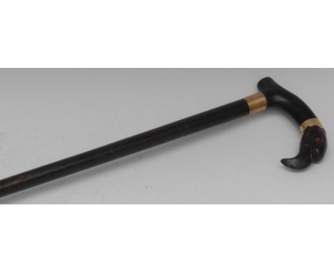 A 19th century novelty ebonised hardwood walking stick, the horn tip carved as a vulture head with inset red glass eyes, yell