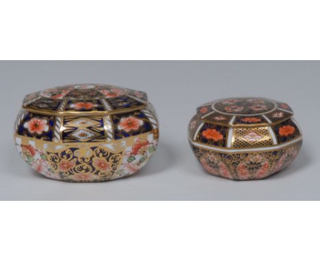 A Royal Crow Derby 1128 pattern octagonal pot and cover, 6.5cm wide, printed mark, date code for 1925;  a 6299 pattern octago