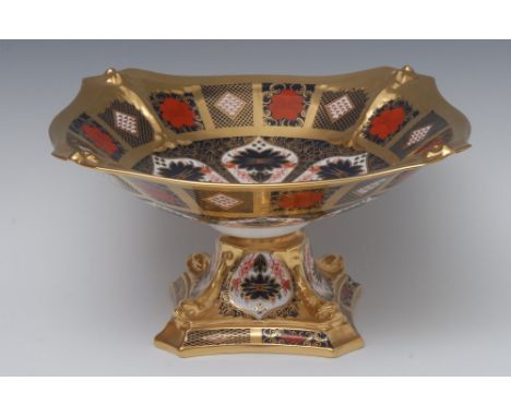 A Royal Crown Derby 1128 pattern dolphin comport, all gold border,  26.5cm wide, printed mark Condition Report: Good conditio