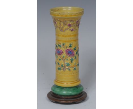 A Chinese two-tone flared trumpet vase, the yellow ground moulded in alternating high and low relief and picked out in furthe