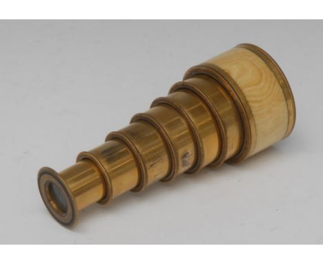 An early 19th century lacquered brass seven-drawer monocular telescope, each drawer with engine turned gadrooned edge, 4.3cm 