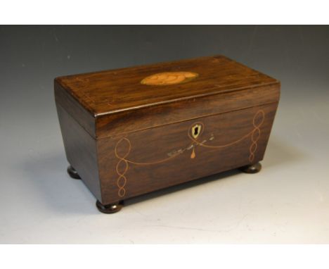 A 19th century sarcophagus tea caddy, the cover inlaid with shell paterea, the front with ivory shield escutcheon and satinwo