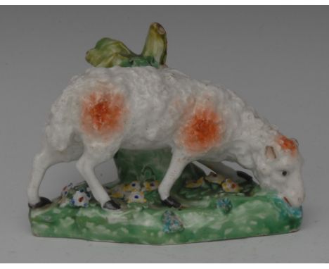 A Derby Patch Mark model, sheep grazing, shaped base encrusted with foliage, 8.5cm high, c.1770