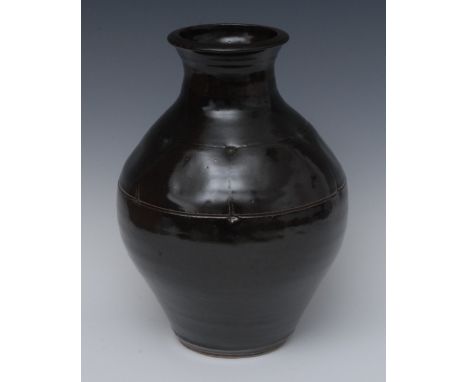 Geoffrey Whiting (British, 1919 -1988), a stoneware vase, with ich tenmoku glaze, incised in lines, 30cm high,  impressed GW 