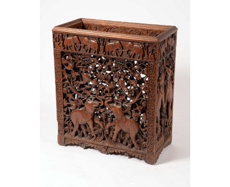 A 19th century Indian hardwood rectangular hall walking stick stand, pierced and carved throughout with elephants, flowers an