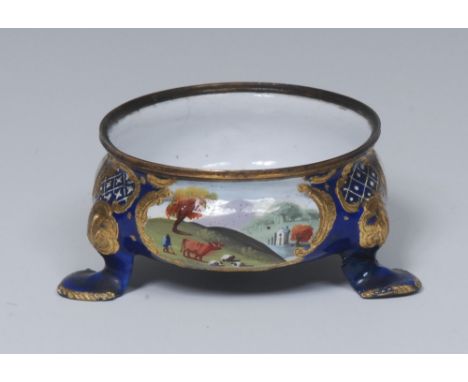 A George III South Staffordshire enamel silver shape cauldron salt, painted with vignettes of cattle and figures in landscape