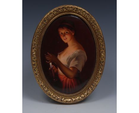 A 19th century German porcelain oval plaque, probably KPM Berlin, painted by K. Stern, signed, of a young lady by candlelight