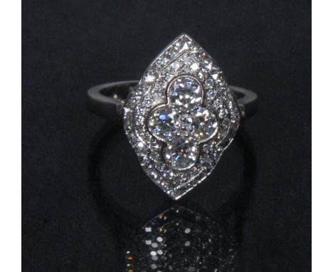 An Art Deco diamond navette panel ring, pave set with thirty one round and thirty six baguette and thirty eight baguette and 