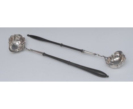 A George III toddy ladle, shaped silver bowl, turned ebonised handle, 40cm long, c.1760;  another (2)