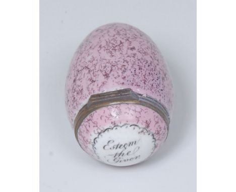 A George III South Staffordshire enamel egg shaped bonbonniere, hinged cover inscribed Esteem the Giver, on a pink eggshell g