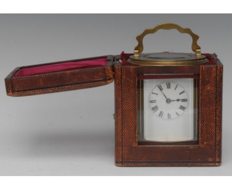 A late 19th century French gilt brass oval five-glass carriage clock, 6cm rectangular dial with Roman numerals, 14-day moveme
