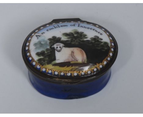 A George III South Staffordshire enamel oval patch box, hinged cover painted with a lamb and inscribed An Emblem of Innocence