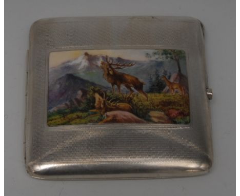 A Continental silver and enamel curved rounded rectangular cigarette case, hinged cover with central panel decorated in polyc