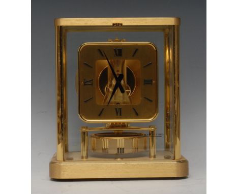 A Jaeger LeCoultre five glass Atmos clock, 10.5cm rounded chapter ring applied with Arabic numerals and baton markers,  lacqu
