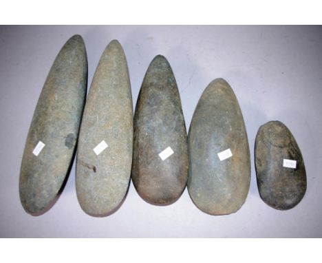 Five various Papua New Guinea stone axe heads collected from the Mount Hagen area during the 1970s 1980s. Length 32cm approx 