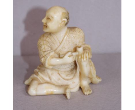 Antique Japanese ivory netsuke - Man with pipe C1920, signed to base, 4cm high approx. May not be exported without CITES docu