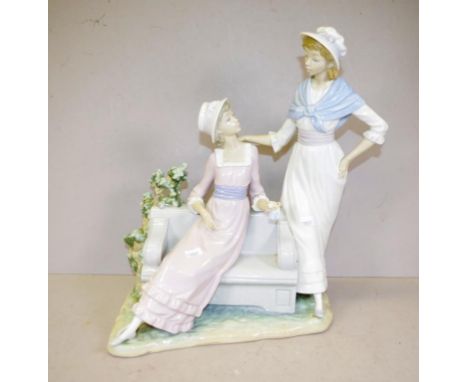 Large Lladro figurine of two ladies on a park seat height 35cm approx (inner finger missing to seated lady)