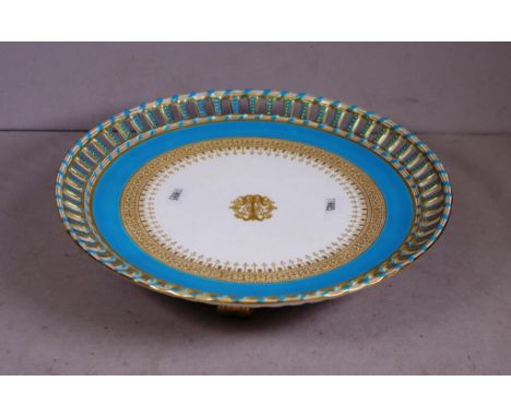 Antique Royal Worcester comport pierced border, on blue ground, tri-footed base. Marked to base. Diameter 25cm approx. Height