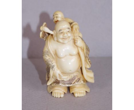 Antique Japanese ivory netsuke - Buddha and child C1920, signed to base, 4.5cm high approx. May not be exported without CITES