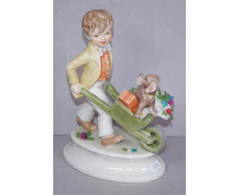 Goebel boy with wheelbarrow & dog figurine 20.5cm high approx., few tiny chips to flowers