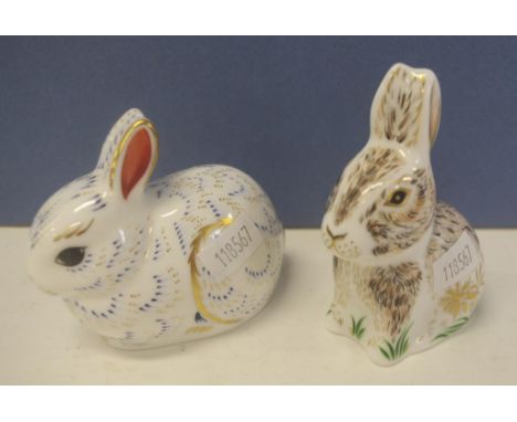 Two Royal Crown Derby "Rabbit " paperweights to include titles Nibbles and Bunny, both with gold button seals to base, one wi