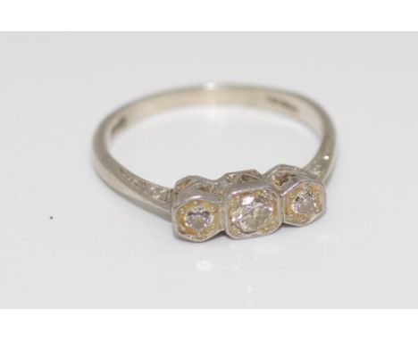 Vintage white gold & diamond ring stamped 18ct & plat. Set with three diamonds in a line. Total weight 2.3gms, together with 