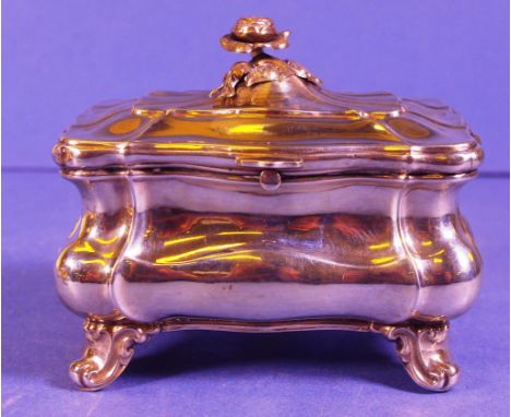 Continental silver lidded trinket box lid with rose and leaf finial, box with 4 feet. Marked to base. Length 13cm approx., He