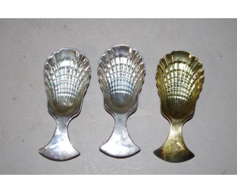 Three Tiffany sterling silver tea caddy spoons including 1 gilded silver, each with shell form bowl, marked verso, with 2 ori