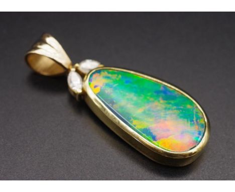 Good 18ct yellow gold fine boulder opal pendant with two marquise diamonds at the bail (approx 0.2ct)