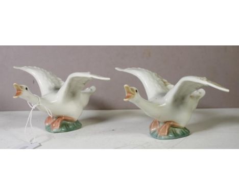 Pair Lladro flying geese marked to bases. Height 8cm approx (each).